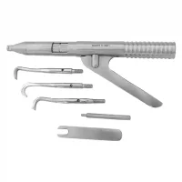 09070021-Arranca-coronas-semiautomatico-3.webp Bomba de vacío odontológica con accesorios de mano y herramienta de succión para procedimientos dentales.