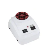 6915-MINI-INCUBADORA-12-AGUJEROS.webp Revestimiento de laboratorio odontológico con múltiples pocillos para moldes dentales y componentes electrónicos para fabricación personalizada.